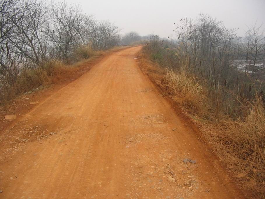 Red dirt road beside the river in Zhuzhou, Hunan